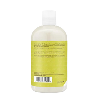 Shea Moisture bottle with a yellow label on a white background