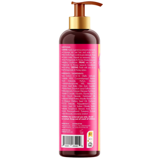 Bottle of Mielle curl cream with pink label and gold pump on a white background