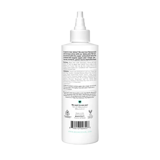 White bottle with text on a white background