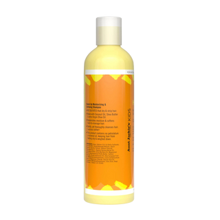 Shampoo bottle with yellow and orange design on a white background