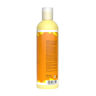 Bottle of shampoo with a yellow label on a white background