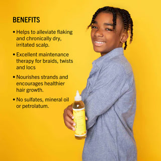 Person holding a bottle of hair care product with benefits listed on a yellow background