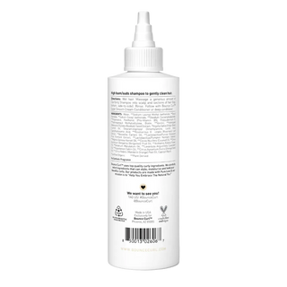 White shampoo bottle with text and branding on a white background. Bottle of Bounce Curl Gentle Clarifying Shampoo on a white background