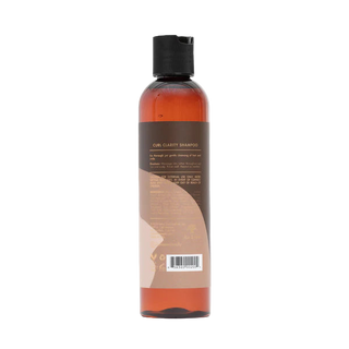 Shampoo bottle with a brown label on a white background