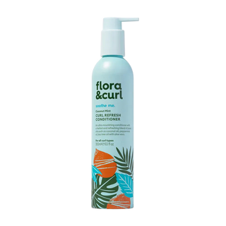 Flora & Curl conditioner bottle on a white background