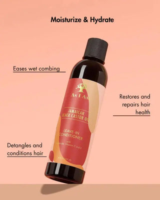 As I Am Jamaican Black Castor Oil leave-in conditioner bottle on a peach background with text highlighting benefits.