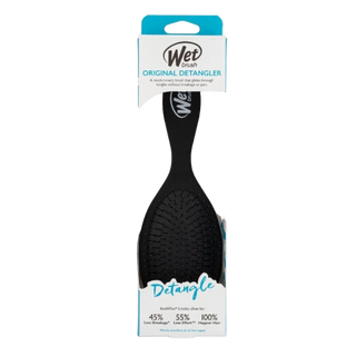 Black detangler brush in packaging with 'Wet Brush' branding on a white background