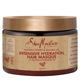 SheaMoisture intensive hydration hair masque jar with gold lid on a white background