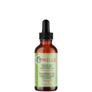 Bottle of Mielle hair oil with a green label on a white background