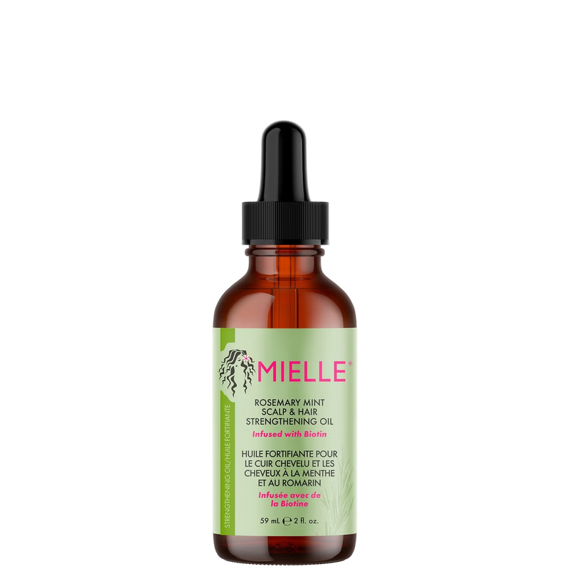 Bottle of Mielle hair oil with a green label on a white background