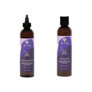 Two bottles of 'As I Am' rice water shampoo and conditioner on a white background