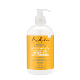 SheaMoisture conditioner bottle with yellow label on a white background