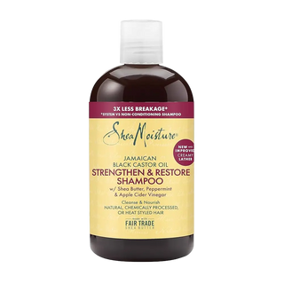 SheaMoisture Jamaican Black Castor Oil Shampoo bottle on a white background