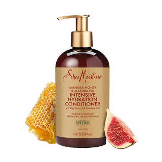 SheaMoisture intensive hydration conditioner bottle with honeycomb and fig slice on a white background