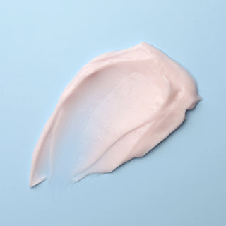 Pink cream swatch on a light blue background