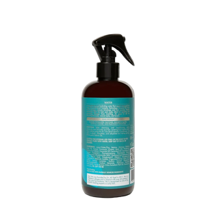 Bottle of 'As I Am' bond water on a white background