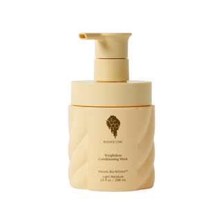 Beige bottle with pump of 'Bounce Curl' weightless conditioning mask on a white background