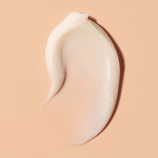 Swirl of cream on a beige background