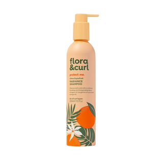 Flora & Curl shampoo bottle with pump on a white background