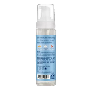 SheaMoisture hair mousse bottle with blue label on a white background