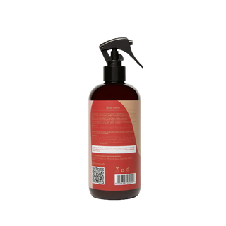 Bottle with red label and black spray nozzle on a white background