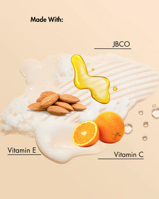 Product ingredients including almonds, oranges, and a yellow liquid labeled 'JBCO' on a beige background.