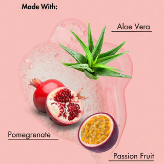 Ingredients used in a product displayed with aloe vera, pomegranate, and passion fruit on a pink background.
