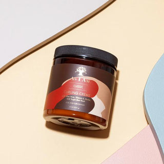 Jar of AS I AM Classic Curling Creme on a colorful background