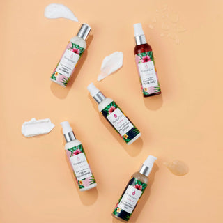 Set of Flora & Curl hair care products with colorful labels on a white background