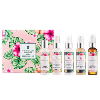 Flora & Curl mini essentials kit with six bottles on a white background