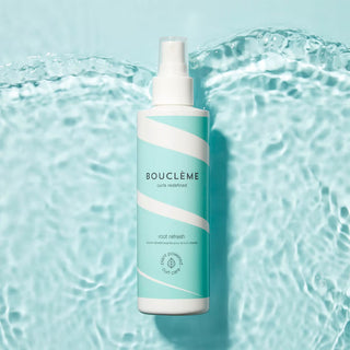 Boucleme bottle with water background