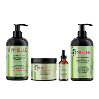 Mielle hair care product set including shampoo, conditioner, mask, and oil on a white background