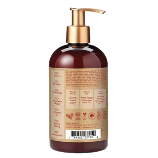 Bottle with gold pump and brown label on a white background